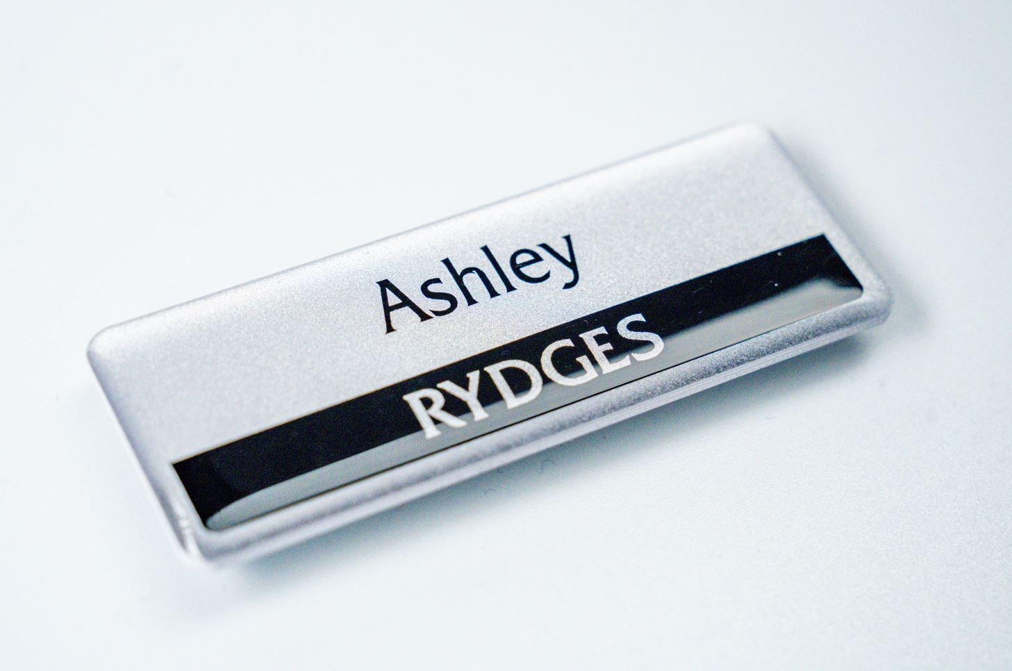 Matte silver Acrylic name badge with resin coating