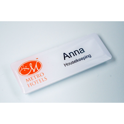 Acrylic name badge with resin coating